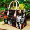 Alkaline Trio Leather Handbag